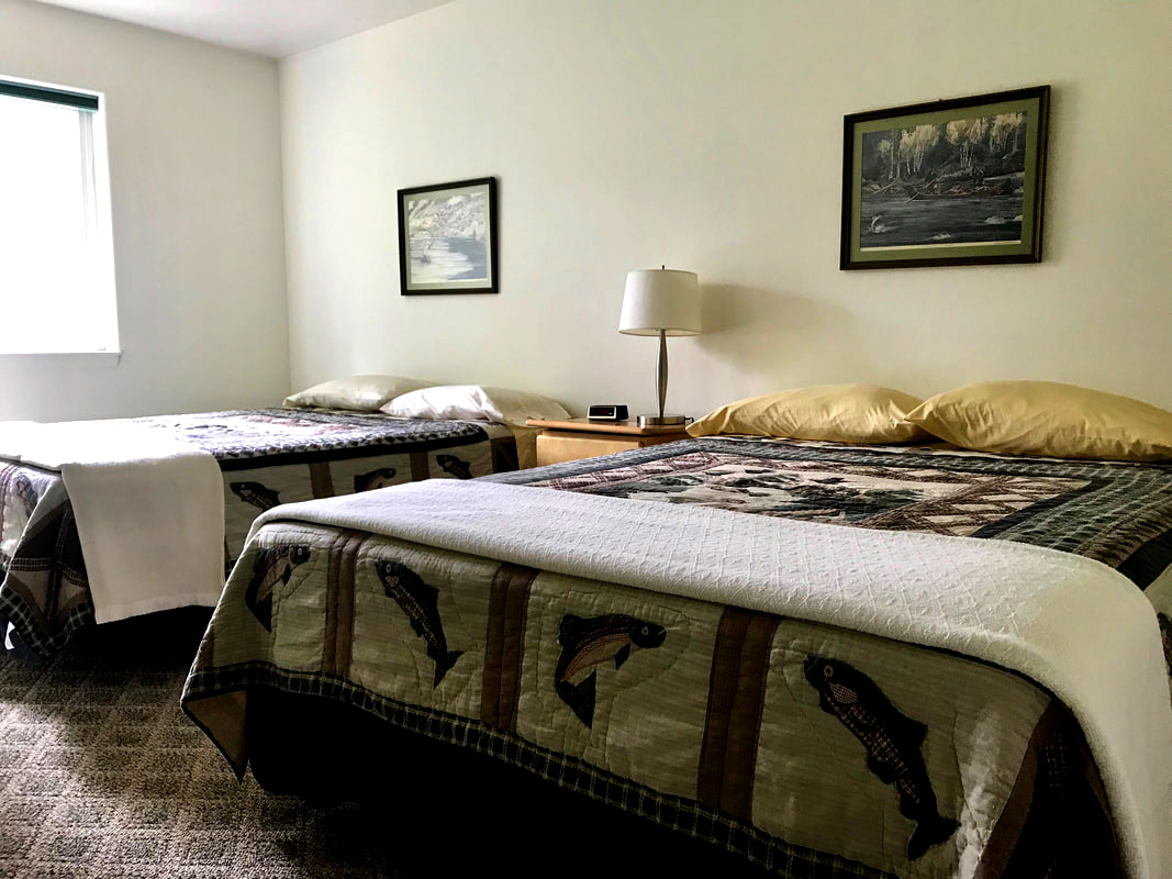 Bedroom at Riverfront Lodge