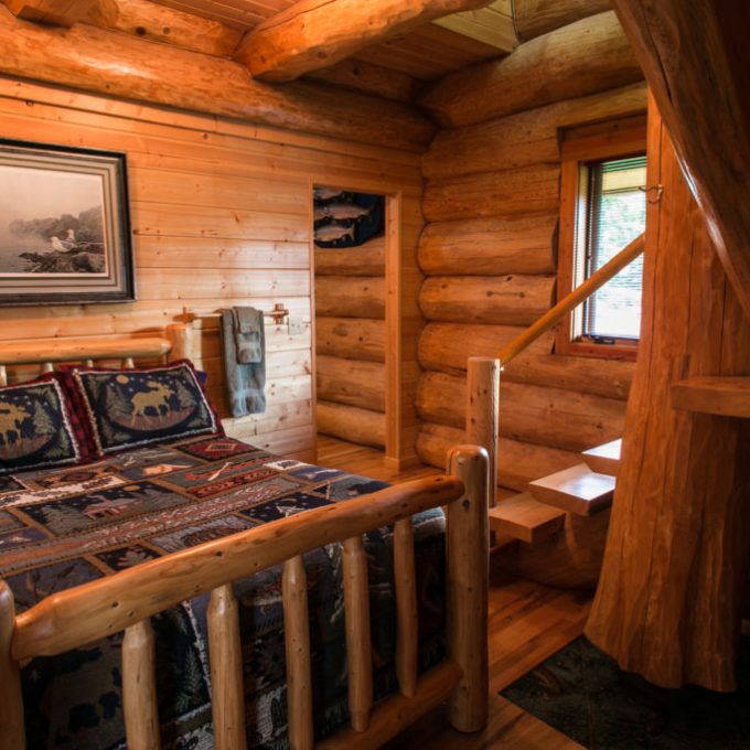 a kitchen with wooden cabinets and a fireplace