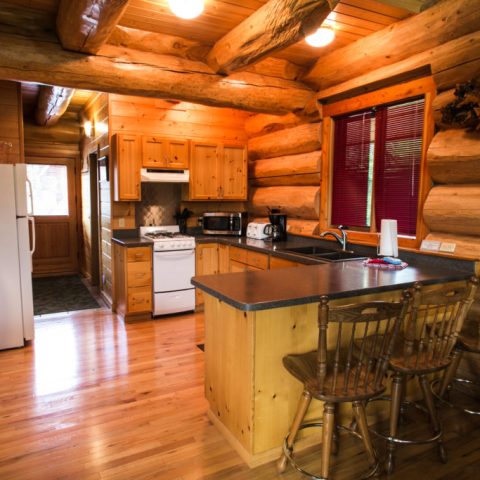 a kitchen with a wood floor