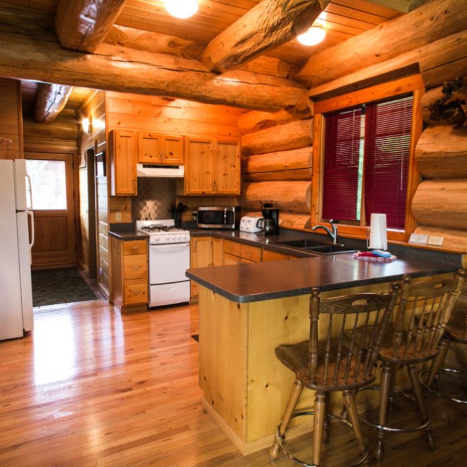 a kitchen with a wood floor