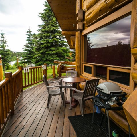 a wooden bench sitting in a chair