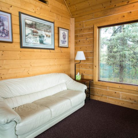 a bedroom with a large window