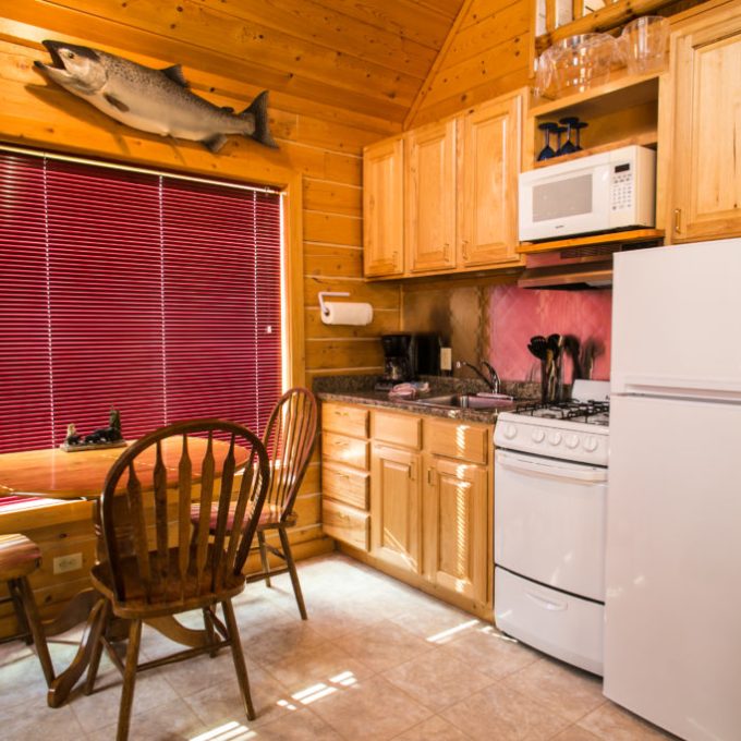 a kitchen with a wood floor