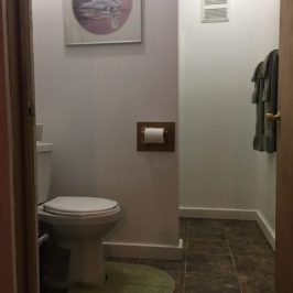 a restroom with a sink and a mirror