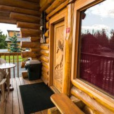 a wooden bench in front of a window