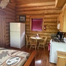 a bedroom with a bed and a fireplace