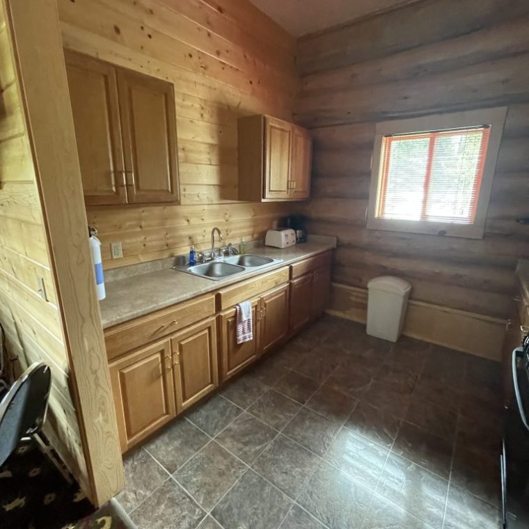 a bedroom with a tile floor