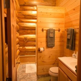 a room with a sink and a mirror